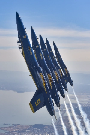 U.S. Navy Blue Angels performing an over-the-top maneuver